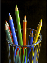 colored pencils in glass